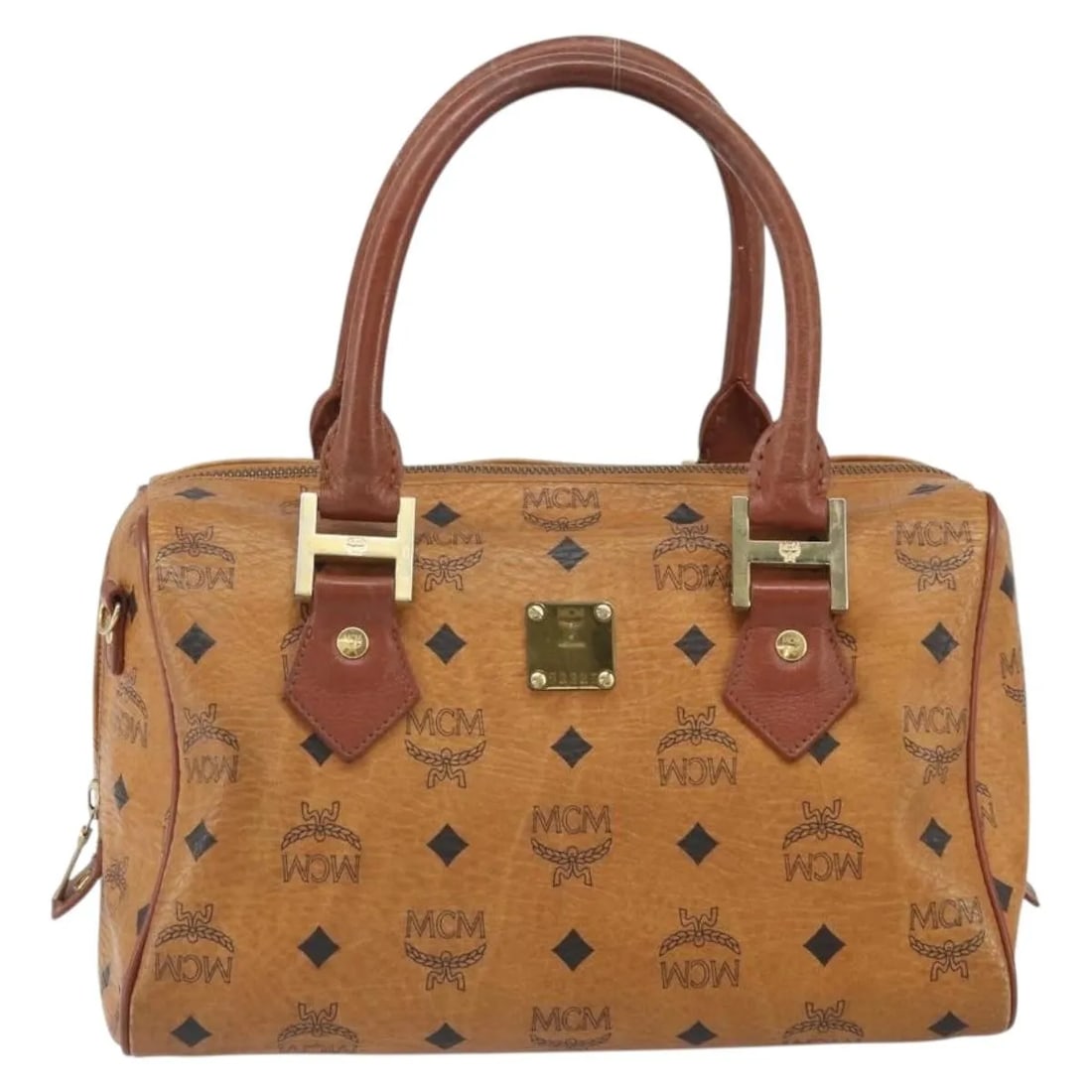 MCM Visetos Logogramme Brown Leather Handbag: MCM Visetos Logogramme Brown Leather Handbag MCM Visetos logogramme leather item in brown, presented in good usable vintage condition. The exterior shows light wear and marks with some loss of shape. 