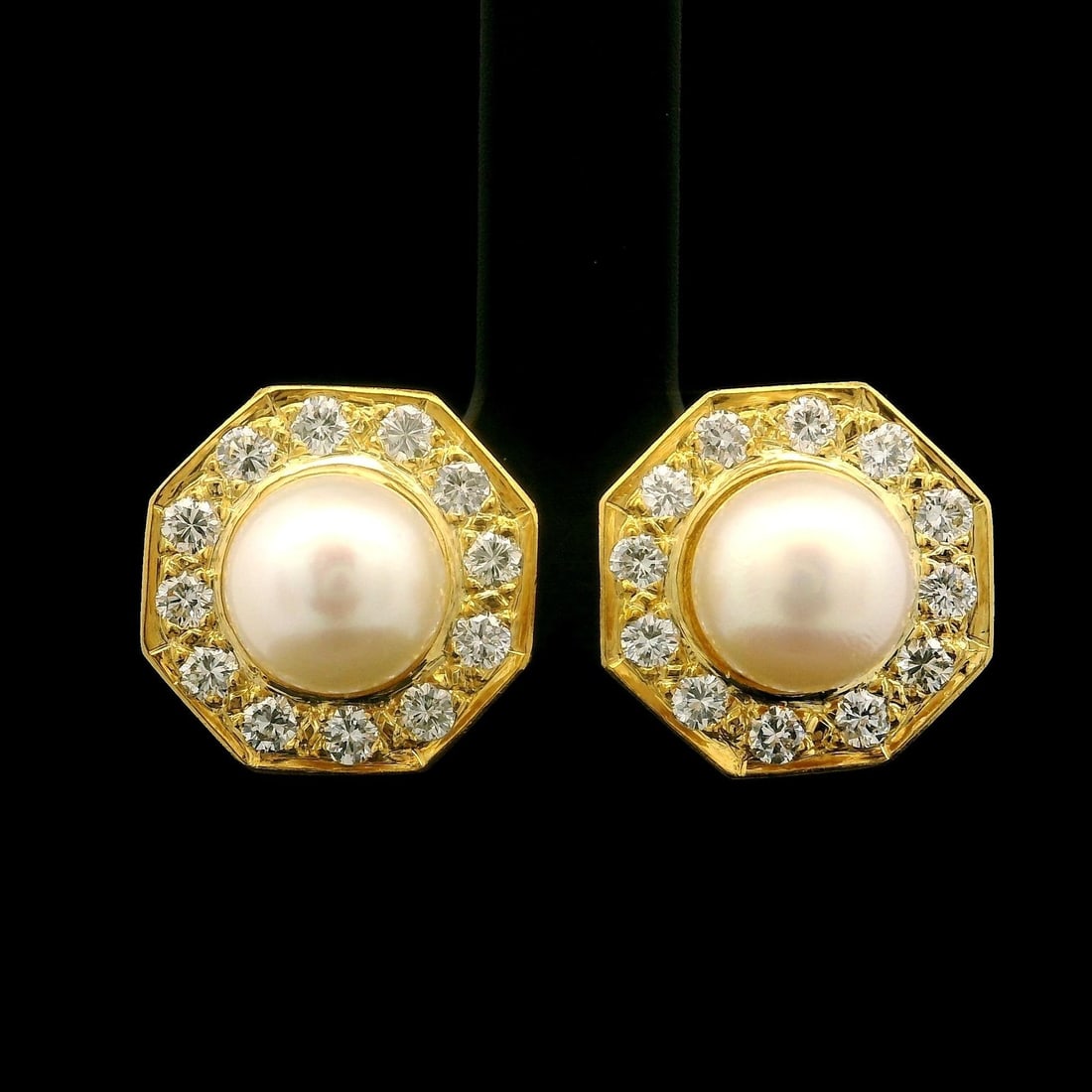 18k Gold Octagon Pearl Diamond Halo Screw-On Stud Earrings: 18k Gold Octagon Pearl Diamond Halo Screw-On Stud Earrings Elevate your elegance with these stunning 18k Gold Stud Earrings featuring genuine cultured pearls and a dazzling diamond halo. Each earring 