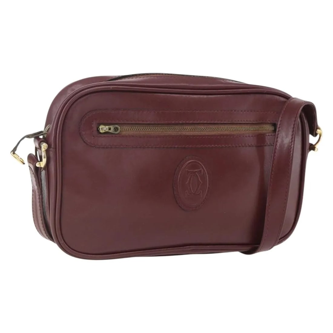 Cartier Must de Cartier Burgundy Leather Shoulder Bag: Cartier Must de Cartier Burgundy Leather Shoulder Bag This Must de Cartier shoulder bag is crafted from burgundy leather and designed for women. It features a shoulder strap and metal fittings. The ba