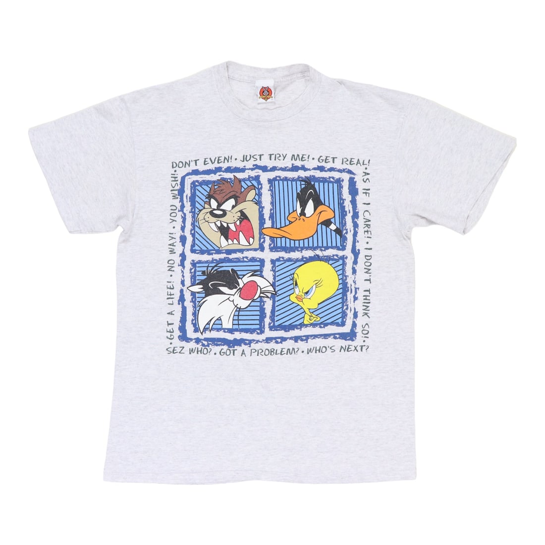 Vintage 1990s Looney Tunes Attitude Graphic Gray Cotton Shirt: Vintage 1990s Looney Tunes Attitude Graphic Gray Cotton Shirt This is an original vintage 1990s Looney Tunes Attitude Shirt, featuring a classic design from the era. The shirt is made from 100% cotton