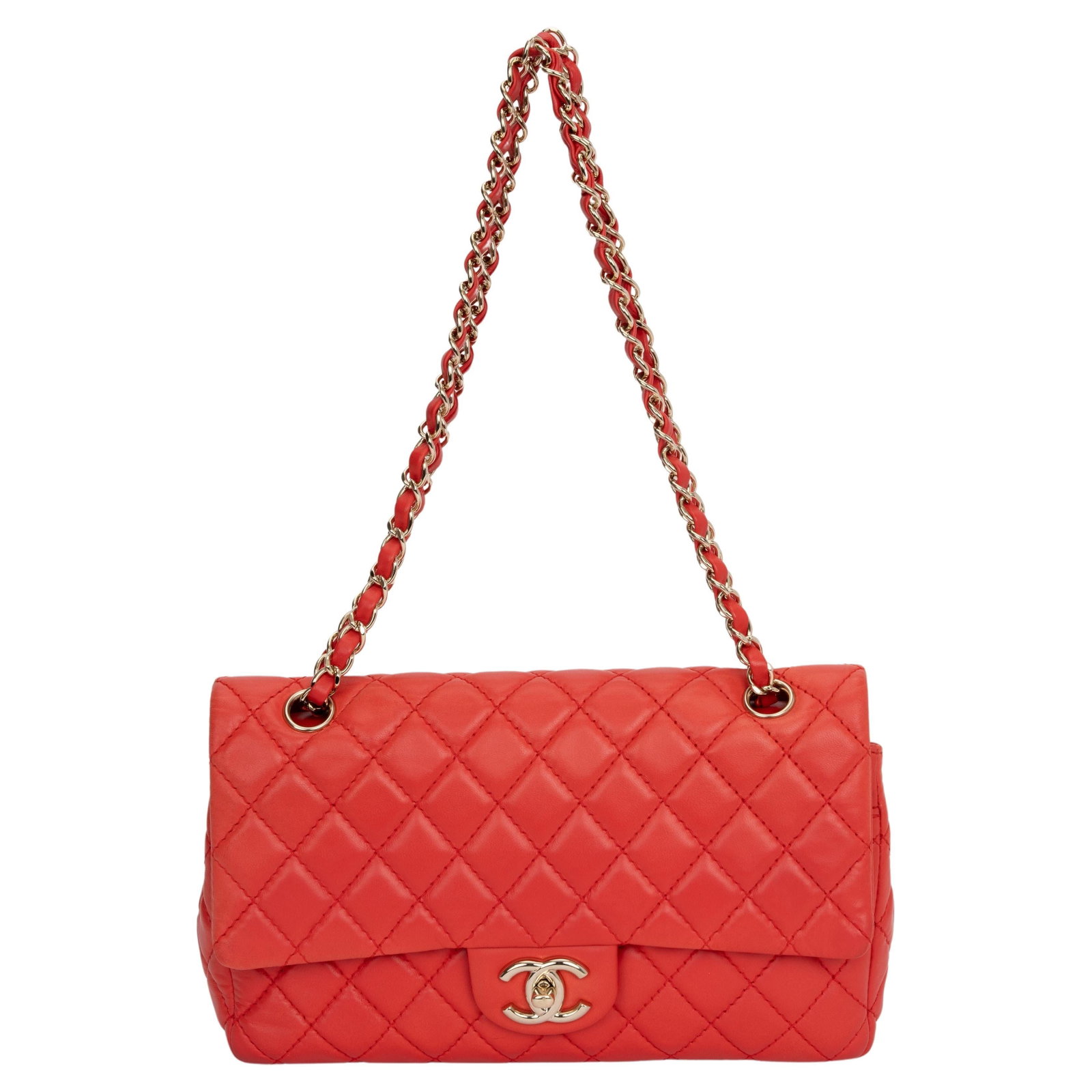 Chanel Red Quilted Classic Flap Bag Lambskin Leather Collection 12: Chanel Red Quilted Classic Flap Bag Lambskin Leather Collection 12 This Chanel Quilted Classic Flap Bag is a luxurious accessory that exemplifies timeless elegance. Crafted from premium lambskin leath