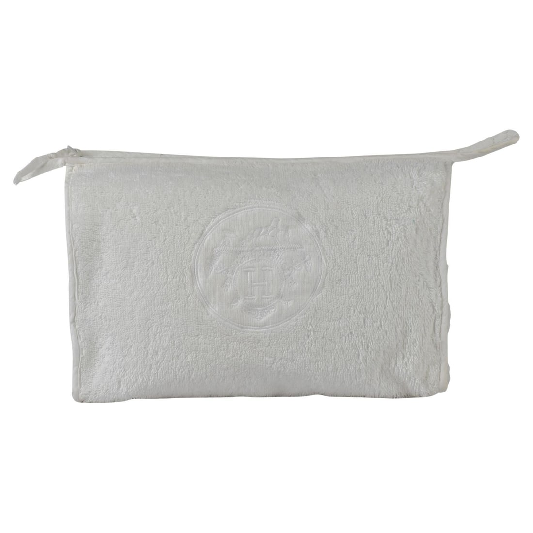 White Terry Cloth Beauty Case by Hermes with Logo: White Terry Cloth Beauty Case by Hermes with Logo This Hermes vintage beauty case is crafted from white terry cloth and features a subtle logo design. Designed for unisex use, it can also function as 