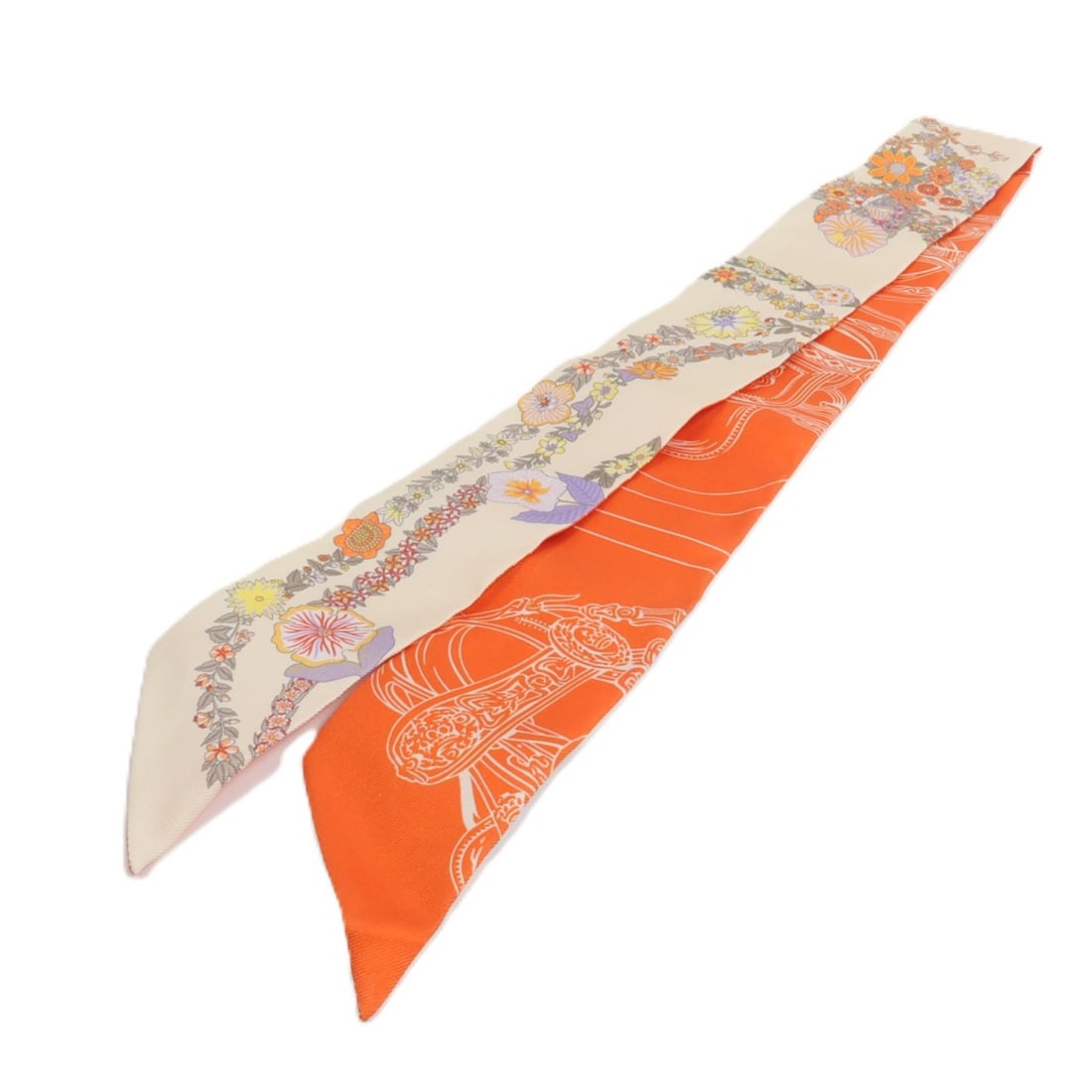 Hermes Brides de Gala en Fleurs Silk Twilly Scarf: Hermes Brides de Gala en Fleurs Silk Twilly Scarf This Hermes Brides de Gala en Fleurs Twilly scarf is crafted from luxurious silk and features a vibrant color palette of vanilla, orange, and kaki. De