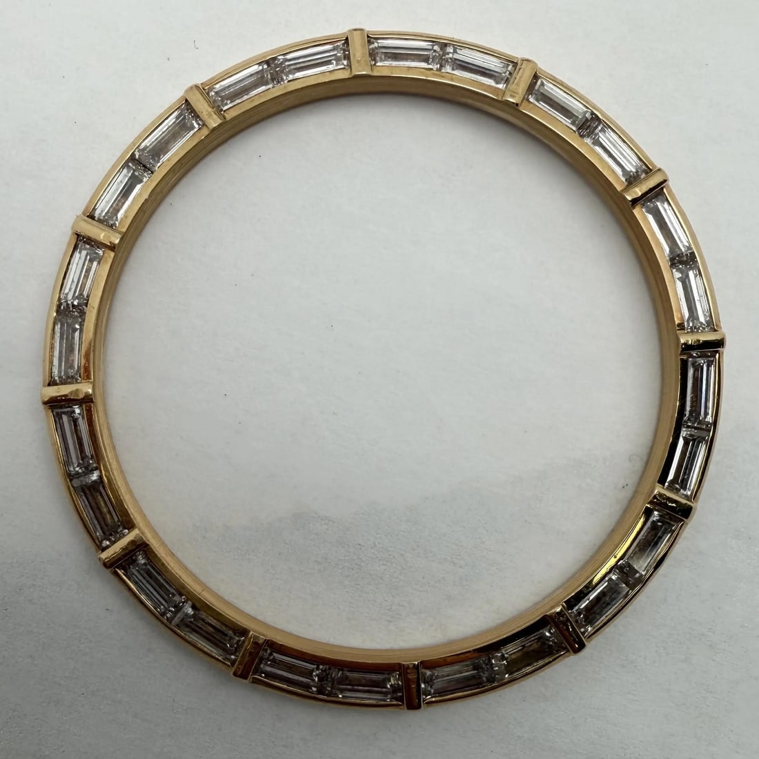 Rolex 19018 18k Yellow Gold Baguette Diamond Bezel: Rolex 19018 18k Yellow Gold Baguette Diamond Bezel This is a custom bezel crafted from 18k yellow gold and set with approximately 2.80 carats of baguette diamonds. Designed for men's luxury watches, i