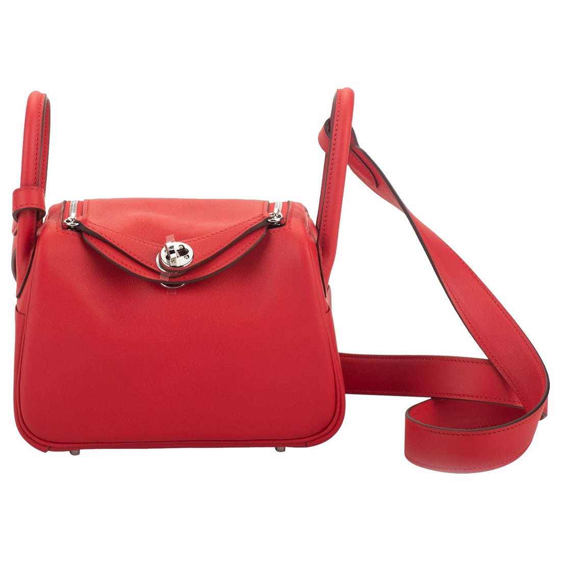 Hermes Mini Lindy Rouge De Coeur Swift Bag with Palladium Hardware: Hermes Mini Lindy Rouge De Coeur Swift Bag with Palladium Hardware Discover the elegance of the Hermes Mini Lindy bag in a striking Rouge De Coeur color, crafted from luxurious swift leather. This des