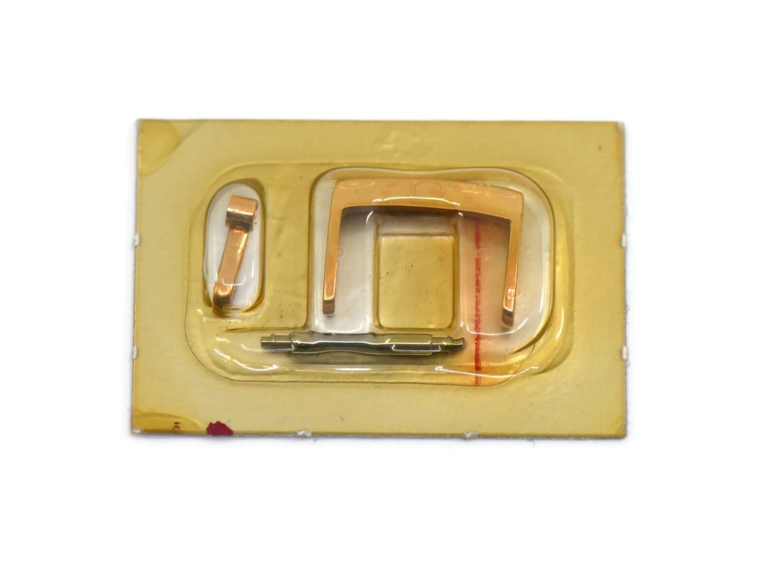 Gold Plated Wristwatch Buckle Model 9451-1604 by Omega: Gold Plated Wristwatch Buckle Model 9451-1604 by Omega This is an authentic Omega gold plated wristwatch band buckle, model 9451-1604. Made in Switzerland, this pre-owned accessory is designed for Ome