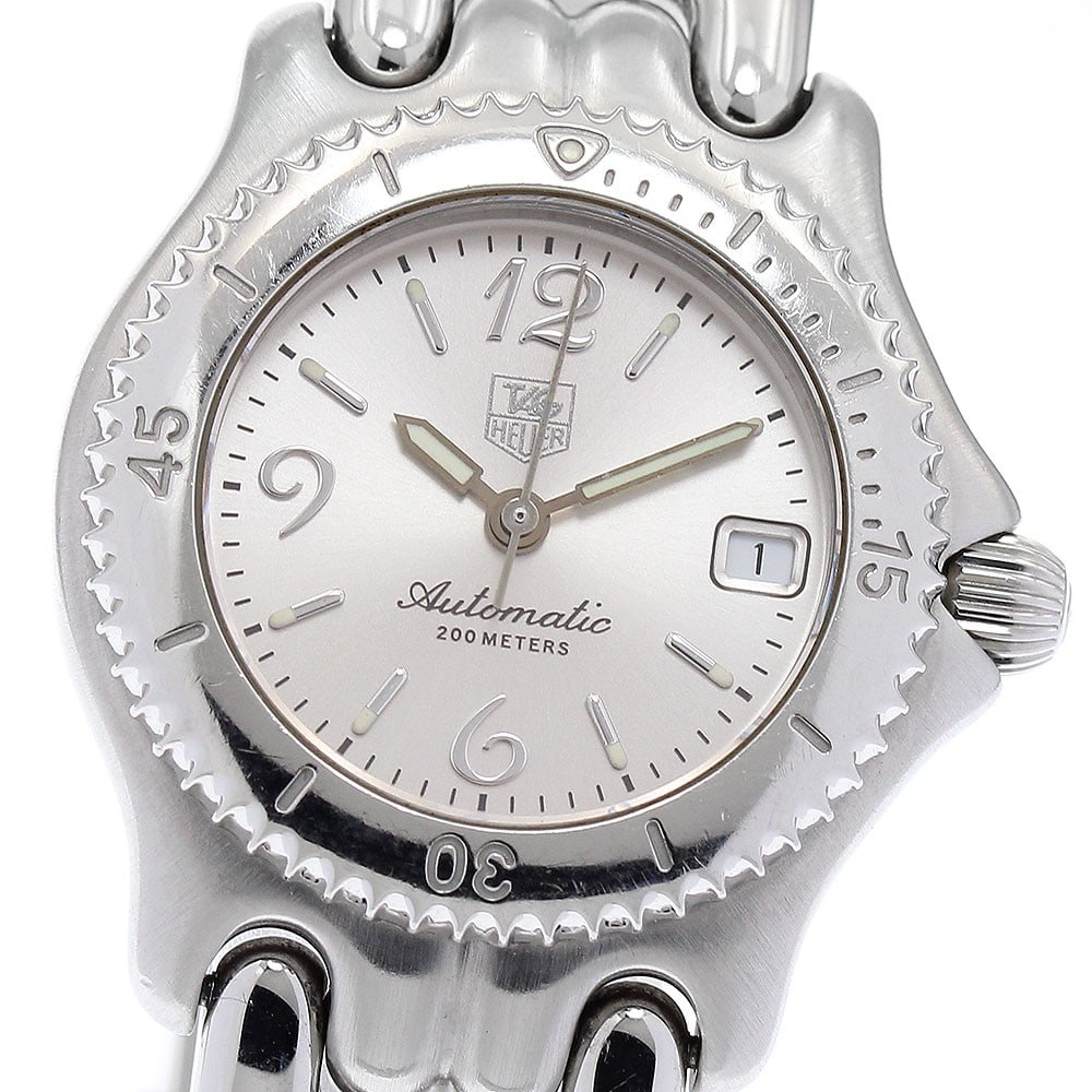 TAG Heuer Cell Women's Automatic Date Watch WG2310: TAG Heuer Cell Women's Automatic Date Watch WG2310 This TAG HEUER WG2310 S/le Date women's wristwatch features a stainless steel case and bracelet, complemented by a silver dial. The watch is powered 