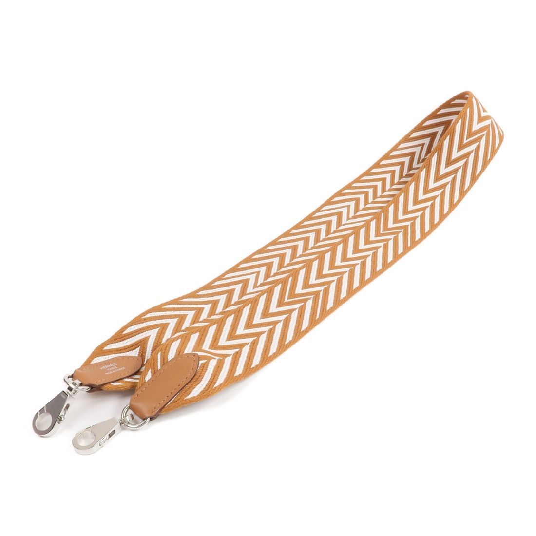 Hermes Sangle Zigza shoulder strap canvas Swift leather gold blanc: Hermes Sangle Zigza shoulder strap canvas Swift leather gold blanc This Hermes Sangle Zigza bag strap is crafted from durable canvas and Swift leather in a gold and blanc color combination. Designed f