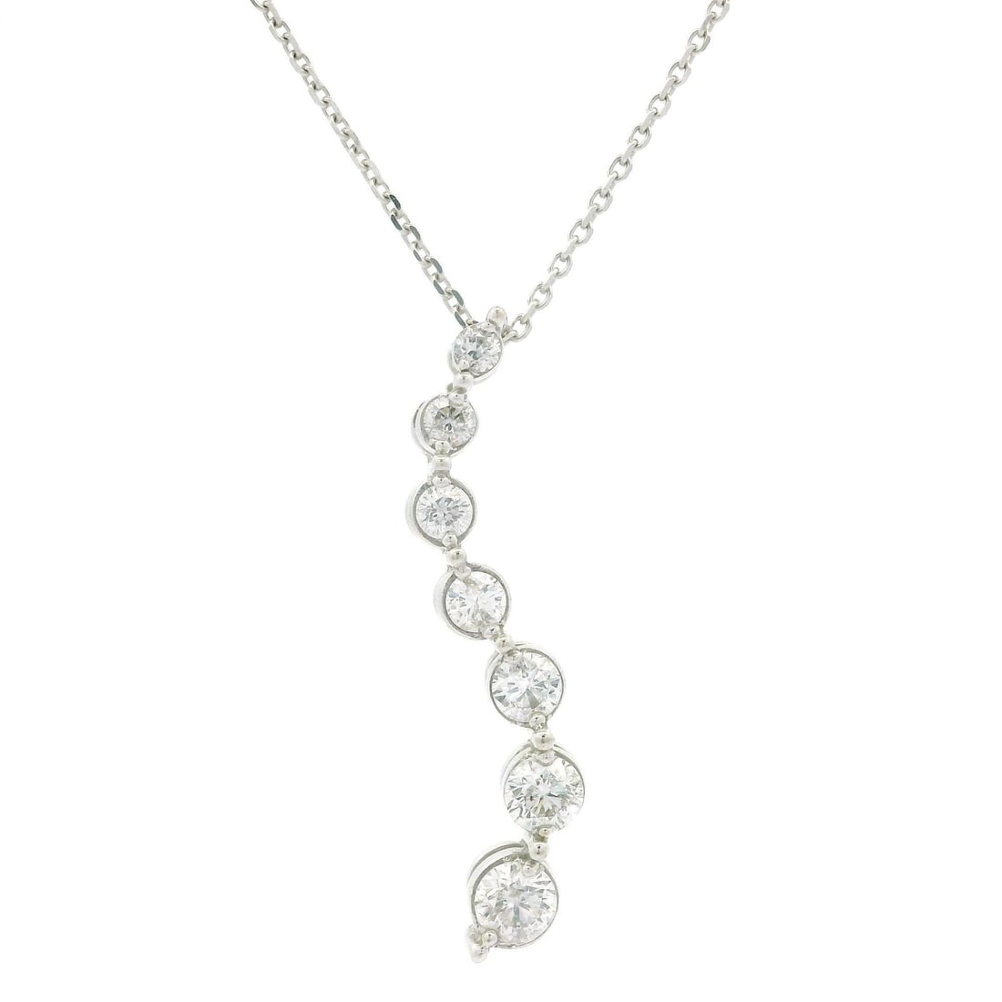 14k White Gold 0.45ct Diamond Wavy Journey Pendant Necklace: 14k White Gold 0.45ct Diamond Wavy Journey Pendant Necklace This stunning 14k white gold pendant features a wavy journey design adorned with seven natural brilliant cut diamonds. The diamonds are pron