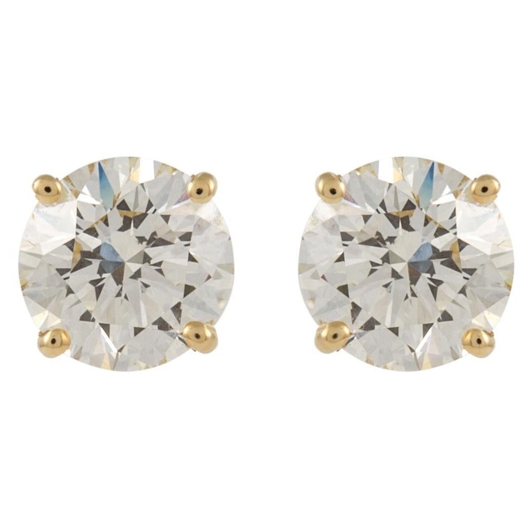 3.37ct Round Diamond Stud Earrings 18k Yellow Gold EGL Certified: 3.37ct Round Diamond Stud Earrings 18k Yellow Gold EGL Certified Elevate your elegance with these stunning 3.37ct Round Diamond Stud Earrings, crafted in luxurious 18k yellow gold. Featuring two match