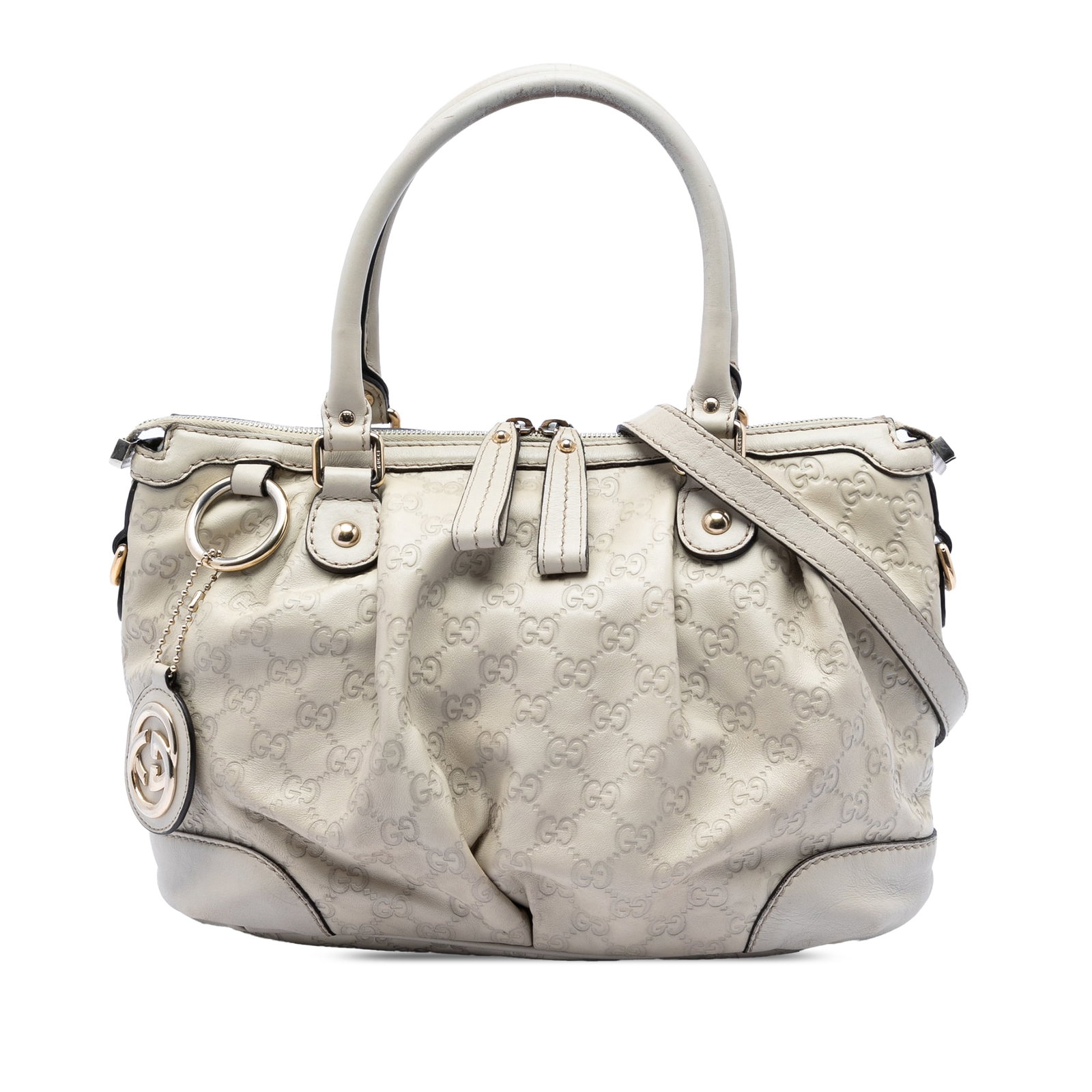 Gucci white leather Guccissima Sukey satchel: Gucci white leather Guccissima Sukey satchel The Guccissima Sukey Satchel is crafted from embossed leather and features rolled leather handles, a detachable flat leather strap, and a top zip closure. 