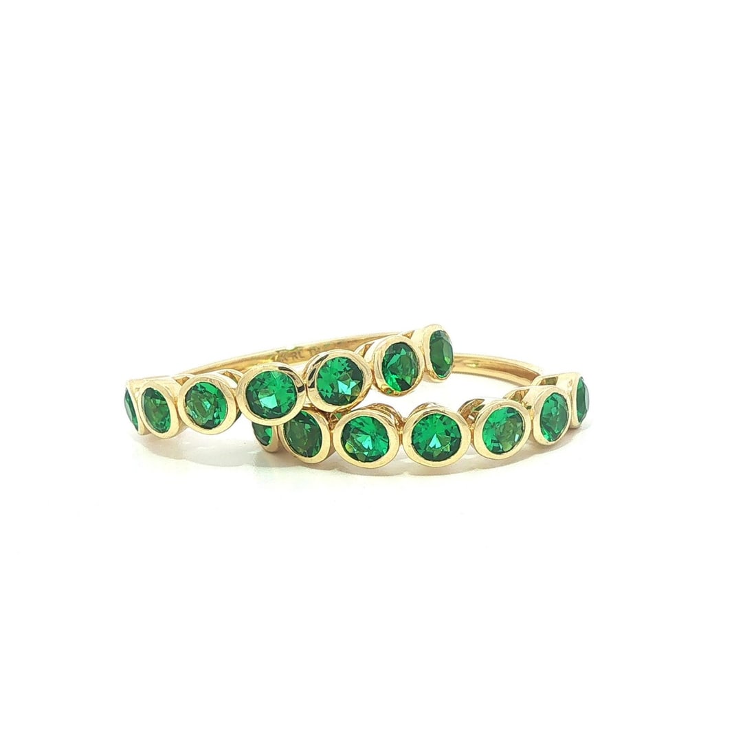14k Yellow Gold Emerald Bezel Guards Pair Ring Size 6: 14k Yellow Gold Emerald Bezel Guards Pair Ring Size 6 This pair of matching stackable bands is crafted from solid 14k yellow gold and features a total of fourteen vivid, rich green lab-grown emeralds.