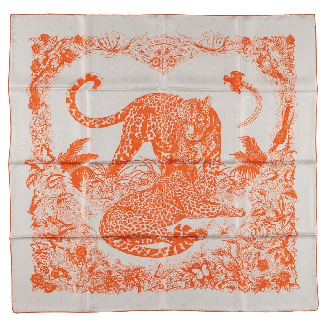 Hermes Jungle Love silk scarf in white orange: Hermes Jungle Love silk scarf in white orange Hermes "Jungle Love" silk scarf in white and orange, crafted from 100% silk with hand-rolled edges and textured silk fabric. This limited edition piece is