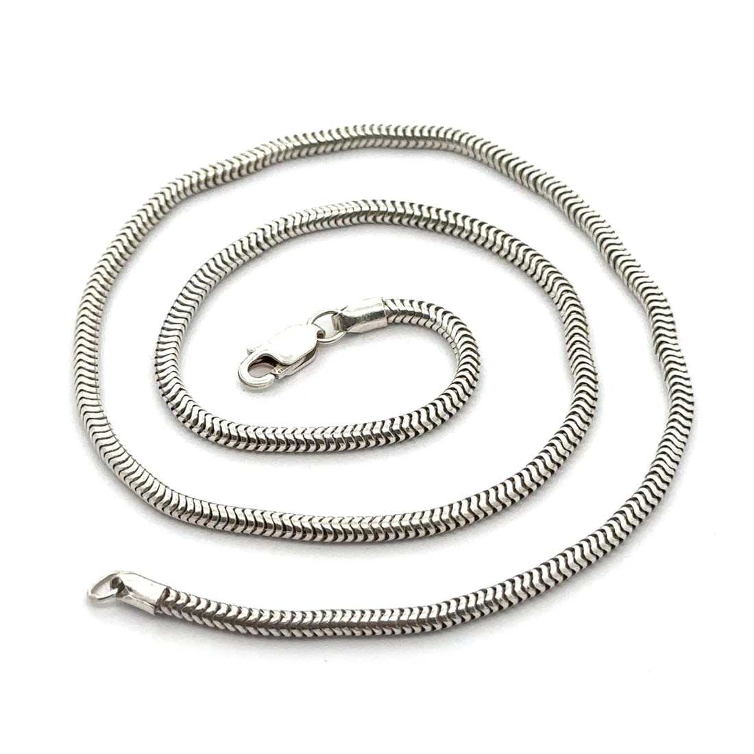 Vintage 16 Inch Sterling Silver Snake Chain with Lobster Clasp: Vintage 16 Inch Sterling Silver Snake Chain with Lobster Clasp This vintage unisex 16" sterling silver snake chain features a well-crafted design with a lobster clasp for secure fastening. Made from h