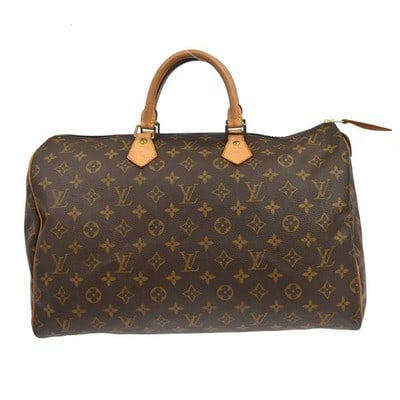 Louis Vuitton Speedy 40 Monogram Canvas Duffle Bag M41522: Louis Vuitton Speedy 40 Monogram Canvas Duffle Bag M41522 Vintage Louis Vuitton Speedy 40 handbag in Monogram canvas with leather trim. This brown duffle-style handbag shows reasonable wear and tear, 
