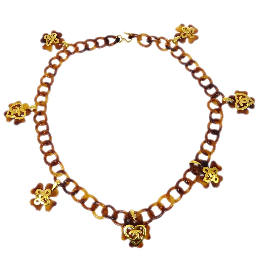 Chanel 95P adjustable acrylic chain belt with clover motif: Chanel 95P adjustable acrylic chain belt with clover motif Chanel chain belt with clover motif in brown acrylic and gold-plated metal. This women's adjustable belt is marked 95P and is presented in ve