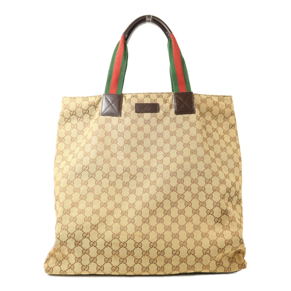 Gucci Brown GG Canvas Tote Bag 131233: Gucci Brown GG Canvas Tote Bag 131233 This GUCCI GG tote bag features the iconic GG canvas in a classic brown color. Crafted in Italy, it offers a spacious design with practical dimensions, making it 