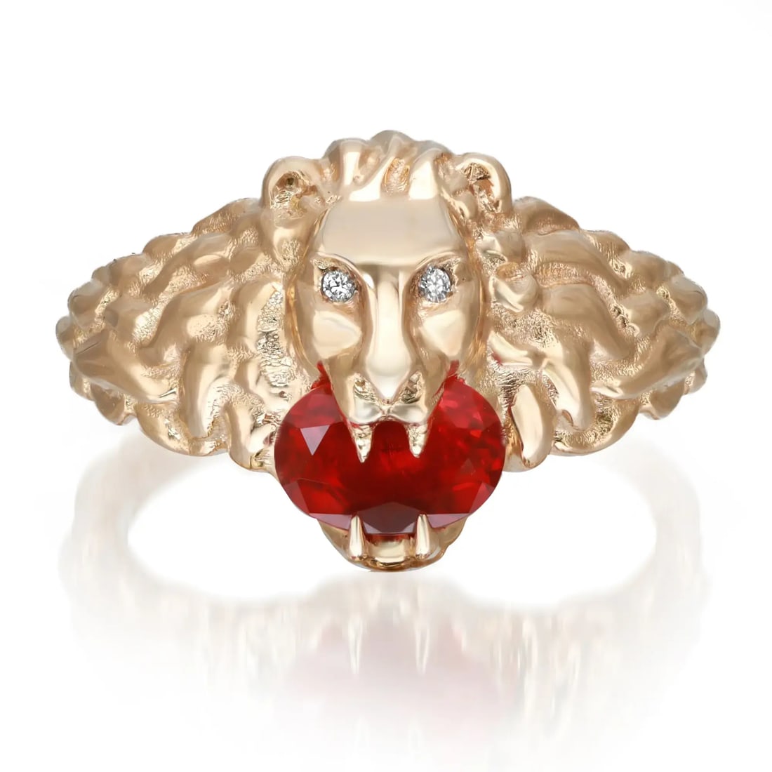 Gucci Lion Head Ring 18K Yellow Gold Fire Opal Diamond Size 7: Gucci Lion Head Ring 18K Yellow Gold Fire Opal Diamond Size 7 This stunning Gucci Lion Head Ring is a bold statement piece crafted from 18K yellow gold. The ring showcases a striking lion head motif a