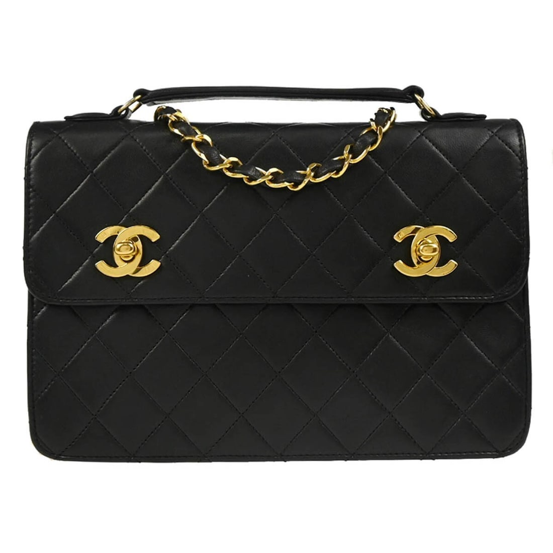 CHANEL CC medium black lambskin top handle bag with strap: CHANEL CC medium black lambskin top handle bag with strap Black lambskin Chanel 2way handbag with a top handle silhouette and logo accent. Made in France, this medium bag features a leather lining, a 