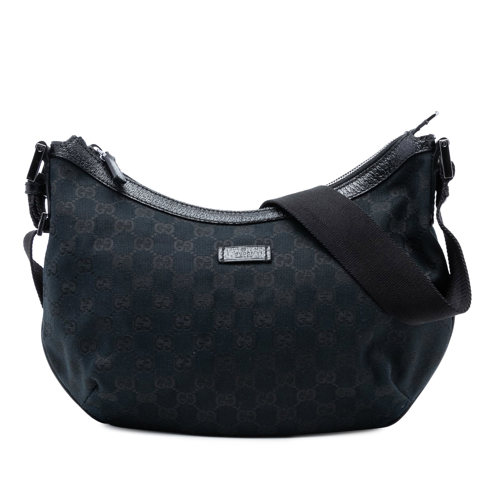 Gucci GG Canvas Black Crossbody Bag with Leather Trim: Gucci GG Canvas Black Crossbody Bag with Leather Trim This Gucci GG Canvas Crossbody bag features a durable canvas body with leather trim, an adjustable flat canvas strap, a secure top zip closure, an
