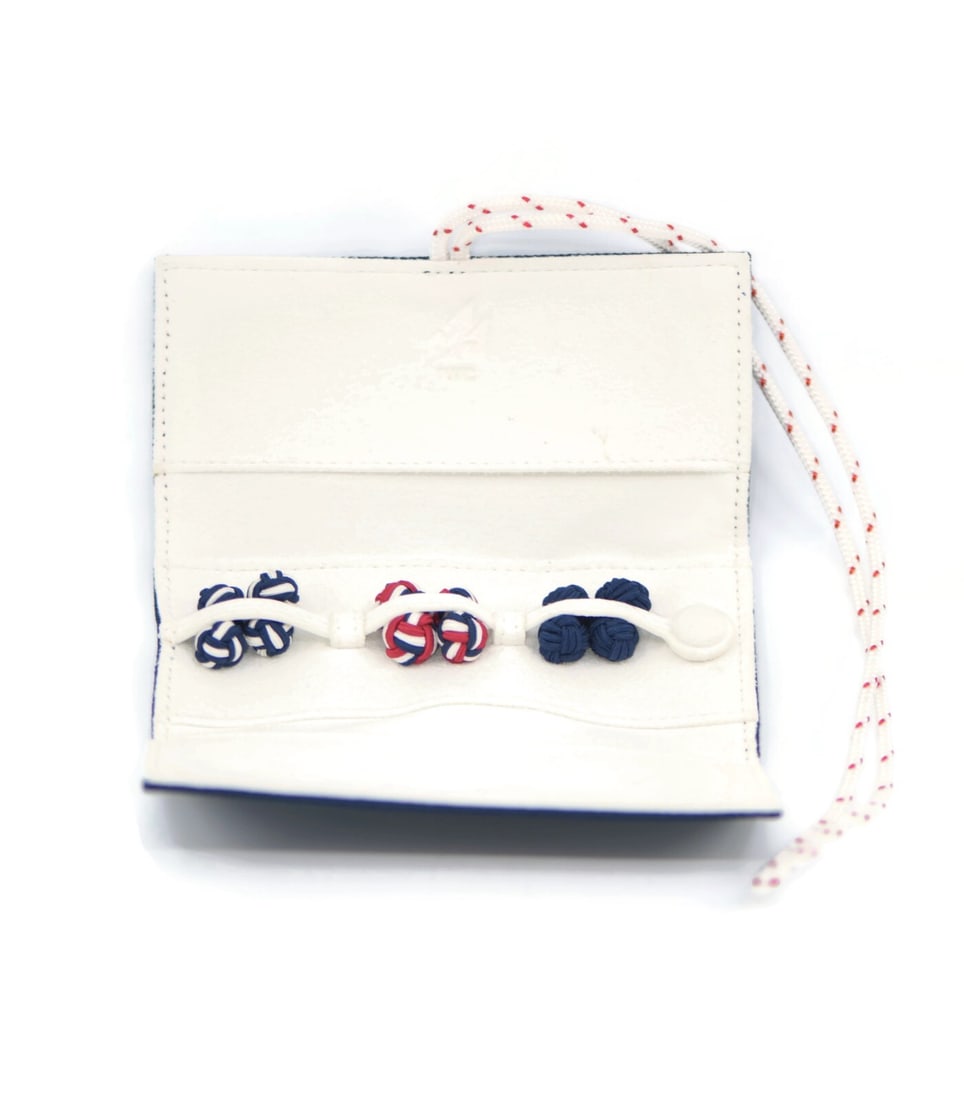 IWC Authentic Fabric Knot Cufflinks with Original Box: IWC Authentic Fabric Knot Cufflinks with Original Box Enhance your formal attire with these IWC Fabric Knot Cufflinks. Featuring a unique knotted design, these cufflinks are crafted with attention to 