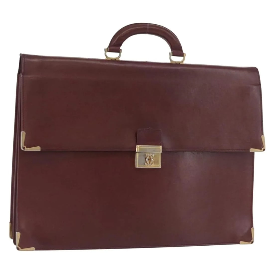 Cartier Vintage Must de Cartier Burgundy Leather Bag: Cartier Vintage Must de Cartier Burgundy Leather Bag Vintage must de Cartier leather piece in burgundy, designed for unisex use. Made in France, this item is in good condition with visible wear consis