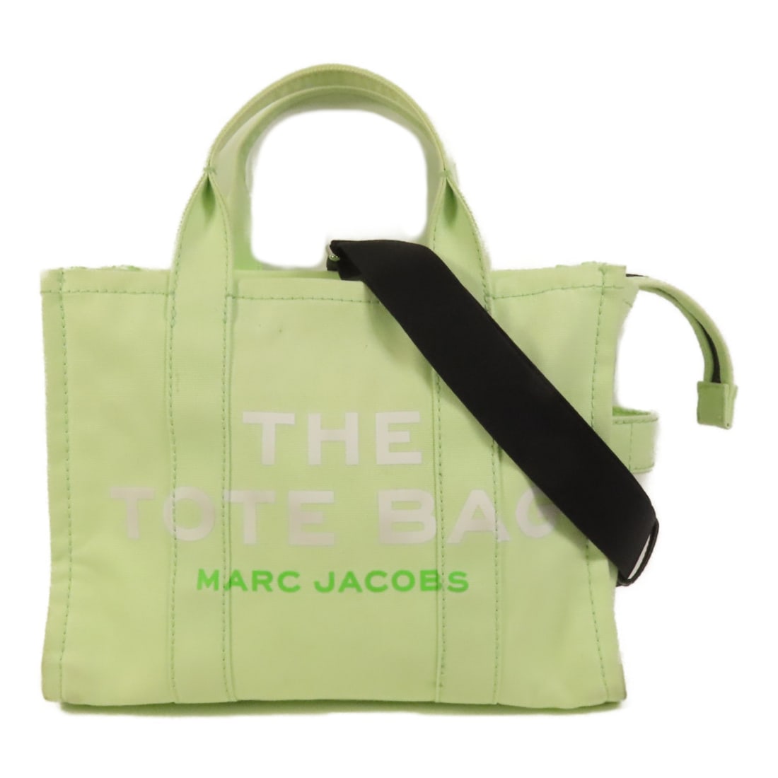 Green Canvas Marc Jacobs Convertible Shoulder and Handbag: Green Canvas Marc Jacobs Convertible Shoulder and Handbag This Marc Jacobs 2-way shoulder bag features a versatile design that allows it to be carried as both a shoulder bag and a handbag. Crafted