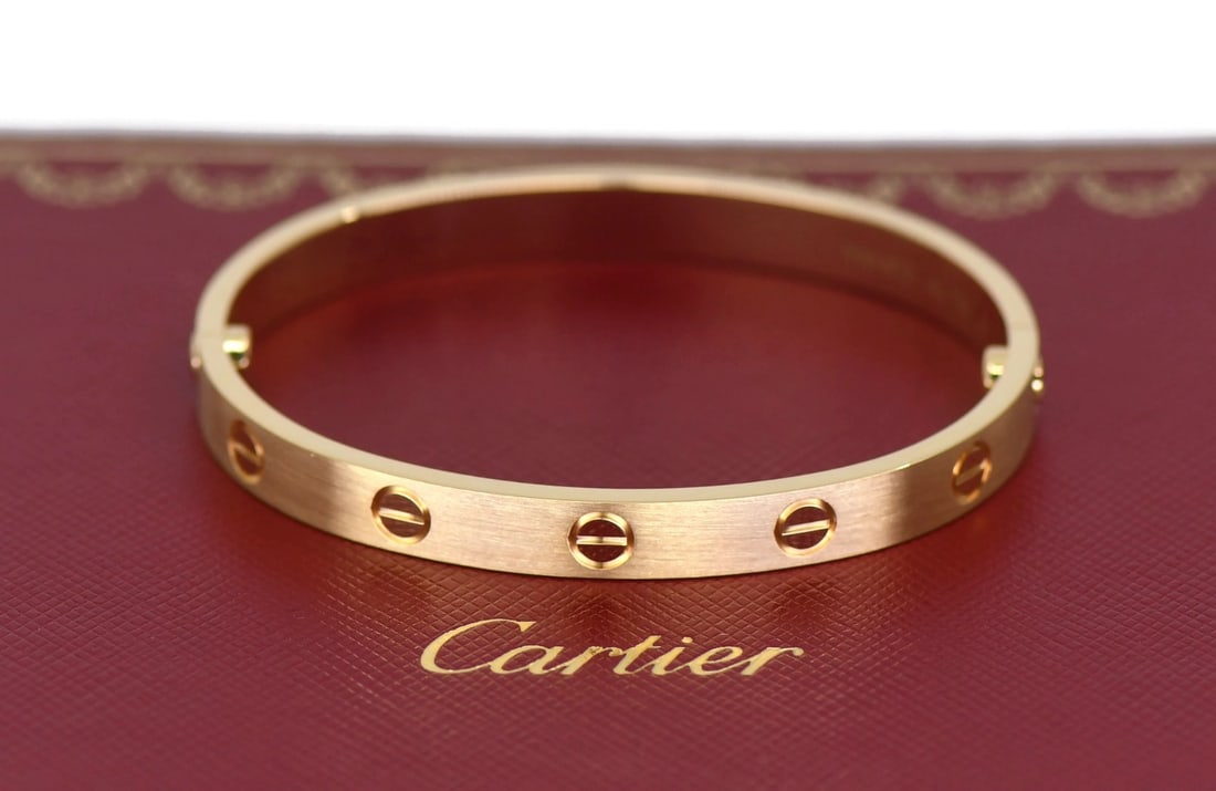 Cartier Love 18K Yellow Gold Bangle Bracelet Size 16: Cartier Love 18K Yellow Gold Bangle Bracelet Size 16 This Cartier Love Bracelet is crafted from 18K yellow gold and features the iconic bangle style. Designed in size 16, it is made in France and come
