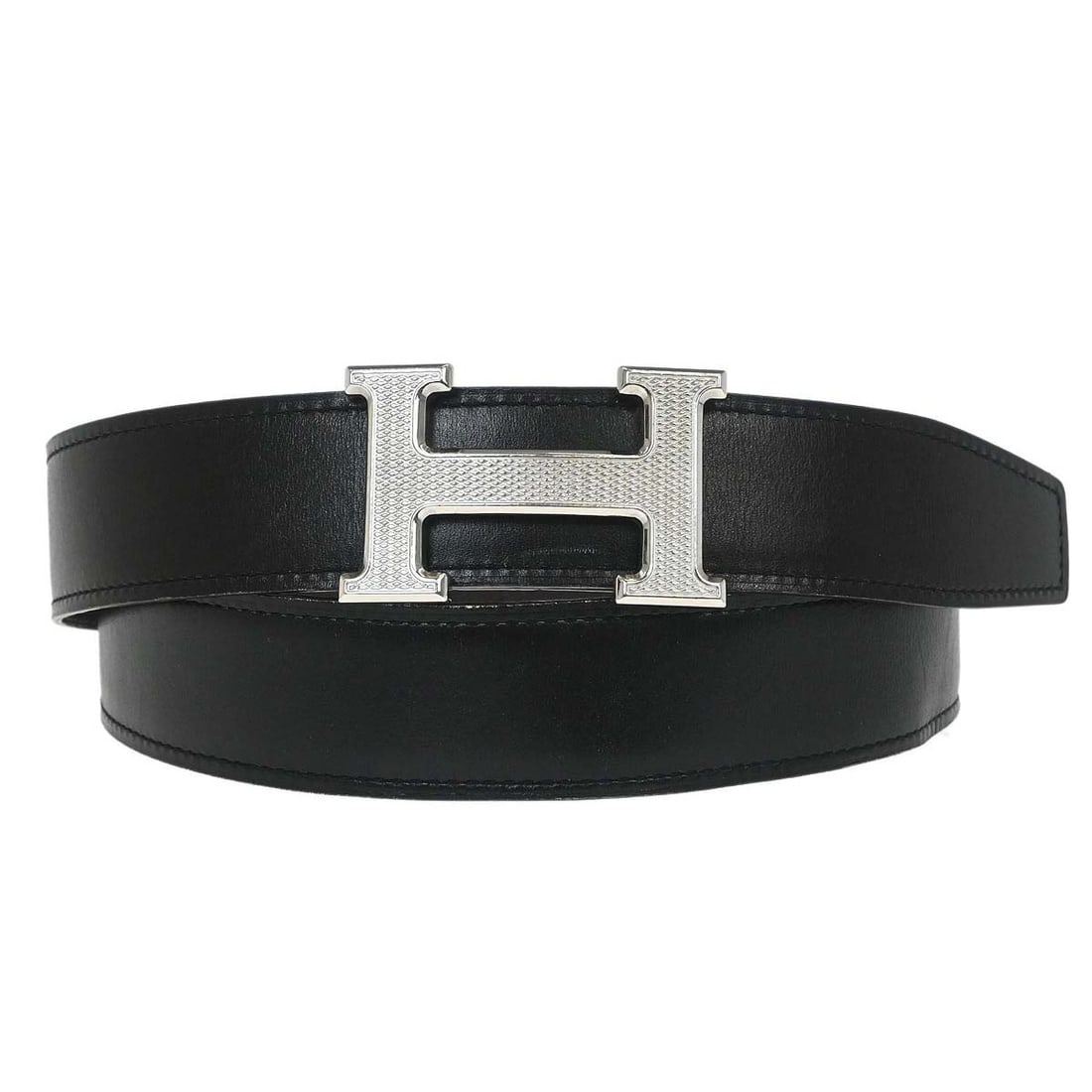 Hermes Constance Guilloche Reversible Belt Black Box Calf Togo Size 95: Hermes Constance Guilloche Reversible Belt Black Box Calf Togo Size 95 Hermes reversible waist belt in black and brown leather with a Constance Guilloche H buckle. Made in France, this women's belt is