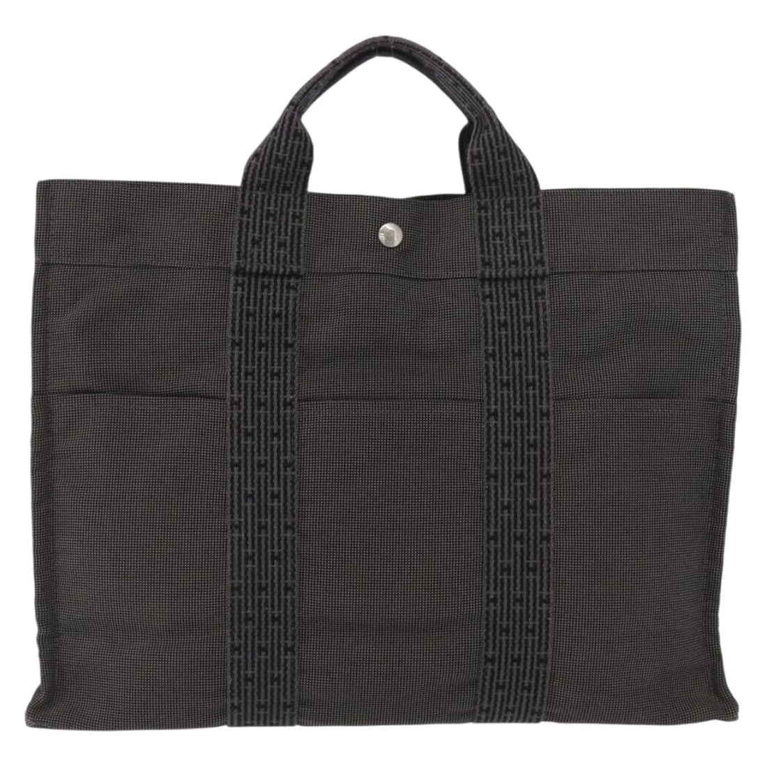 Hermes Herline Gray Canvas Tote Bag 43cm by 30cm by 10cm: Hermes Herline Gray Canvas Tote Bag 43cm by 30cm by 10cm This Hermes Fourre-tout Herline canvas tote bag features a gray canvas construction designed for female use. It shows signs of wear including s