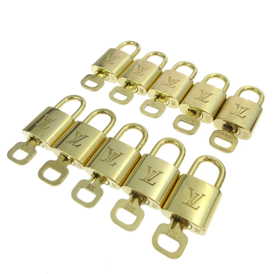 10 Piece Louis Vuitton Gold Tone Padlock and Key Bag Charm Set: 10 Piece Louis Vuitton Gold Tone Padlock and Key Bag Charm Set Set of 10 Louis Vuitton padlock and key bag accessory charms in a gold-tone finish. Made in France, this unisex accessory set shows overa