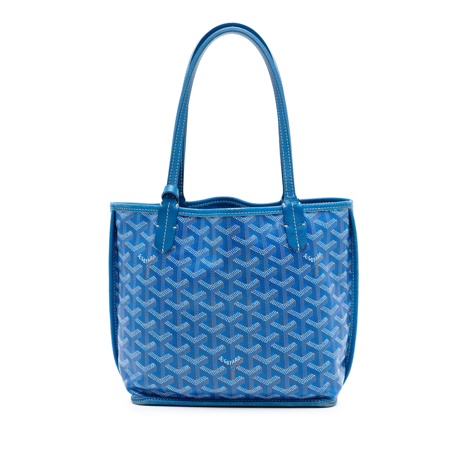 Goyard Mini Goyardine Reversible Anjou Blue Tote: Goyard Mini Goyardine Reversible Anjou Blue Tote This Mini Goyardine Reversible Anjou bag features a coated canvas body with leather trim, flat leather handles, an open top, and an interior flap pouch