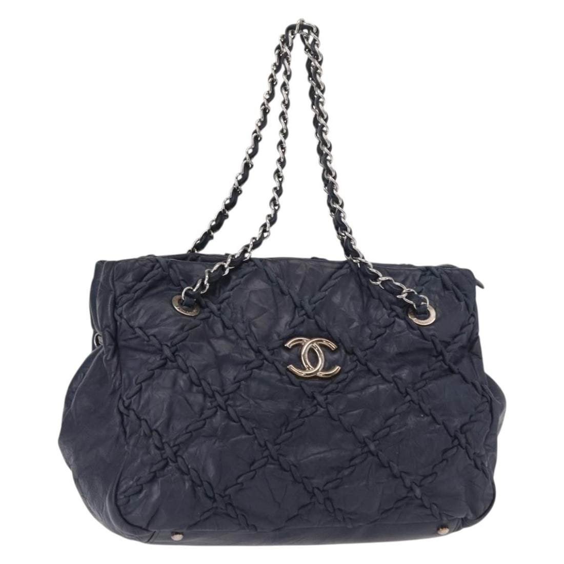 CHANEL Ultra Stitch Calfskin Tote in Navy with Silver CC: CHANEL Ultra Stitch Calfskin Tote in Navy with Silver CC Chanel Ultra Stitch chain tote bag in navy leather with silver-tone CC detailing. Made in Italy, this women's tote includes a dust bag. Conditi