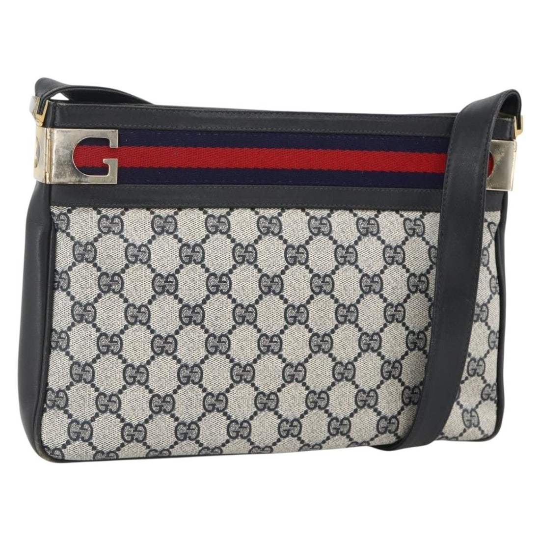 Gucci GG Supreme Sherry Line Navy PVC Shoulder Bag Red Gold Trim Italy: Gucci GG Supreme Sherry Line Navy PVC Shoulder Bag Red Gold Trim Italy This GUCCI Sherry Line GG Supreme shoulder bag features a classic navy, gold, and red design crafted from PVC leather and GG canv