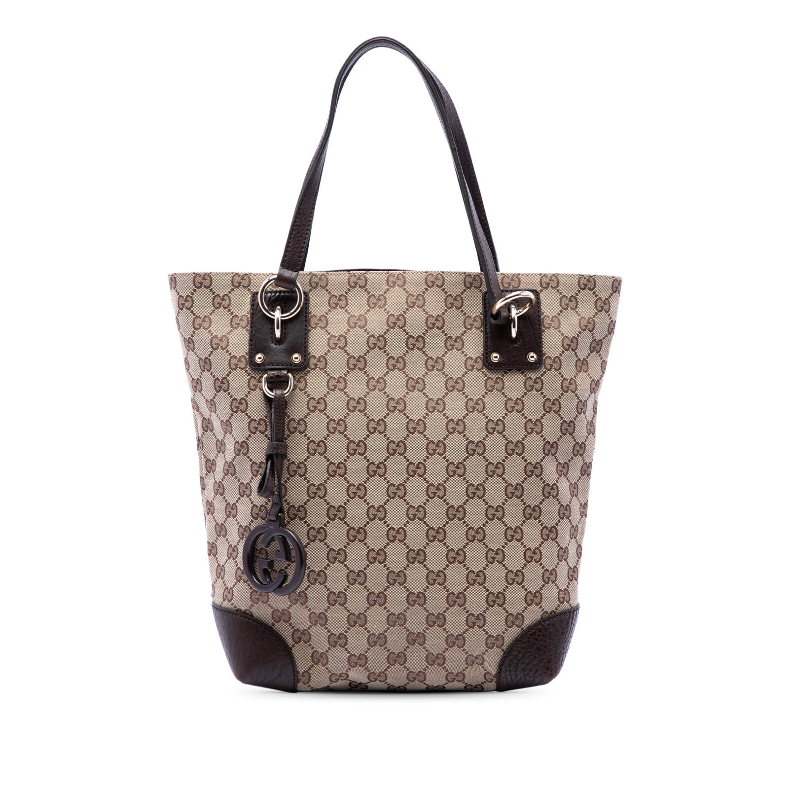Gucci GG Charm Tote Beige Canvas Handbag with Leather Trim: Gucci GG Charm Tote Beige Canvas Handbag with Leather Trim Gucci GG Canvas GG Charm Tote in beige canvas with leather trim and a GG charm. This tote features flat leather handles, an open top with a m