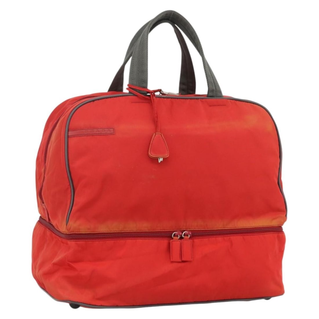 Prada Red Nylon Boston Bag with Silver Tone Hardware and Accessories: Prada Red Nylon Boston Bag with Silver Tone Hardware and Accessories This is a Prada Boston bag crafted from red nylon with silver-tone accents, designed for women. The bag features dual handles, a sp