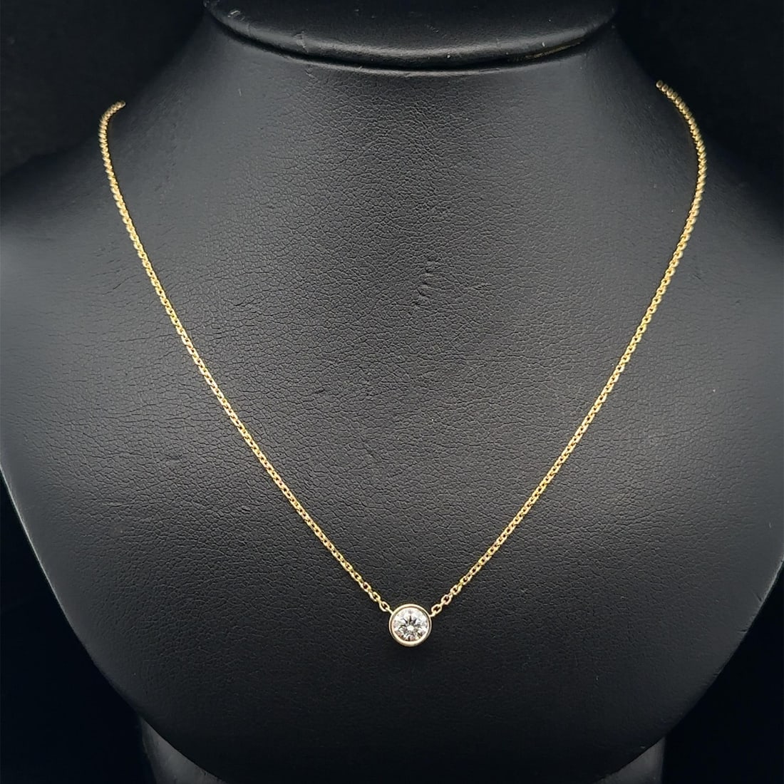 0.32ct Natural Diamond Bezel Pendant Necklace in 14k Yellow Gold Adjustable Chain: 0.32ct Natural Diamond Bezel Pendant Necklace in 14k Yellow Gold Adjustable Chain This un-used necklace features a natural round brilliant-cut diamond solitaire weighing exactly 0.32 carats, bezel set