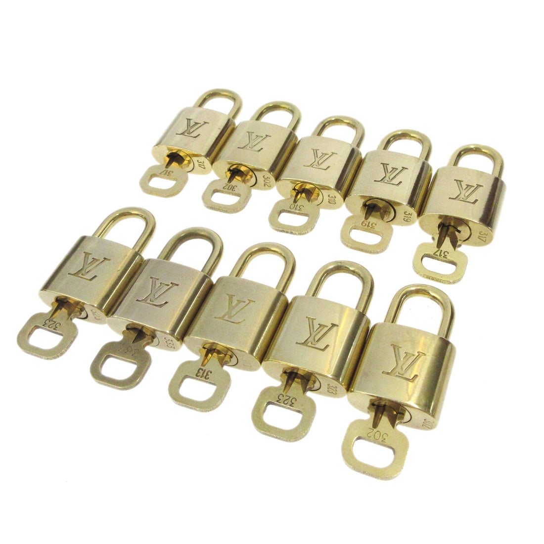 10 Louis Vuitton gold tone padlocks with keys bag charms: 10 Louis Vuitton gold tone padlocks with keys bag charms Louis Vuitton padlock and key bag accessory charm set in gold-tone finish. This 10-piece set is made in France and shows overall signs of use w