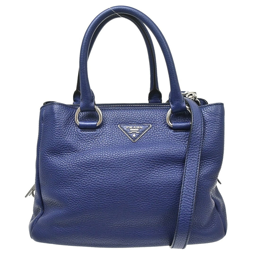 Prada 180 E Blue Leather Tote Bag with Shoulder Strap: Prada 180 E Blue Leather Tote Bag with Shoulder Strap Prada 2-way tote handbag in blue leather with black canvas lining and a detachable shoulder strap. This medium women's bag is made in Italy and fe