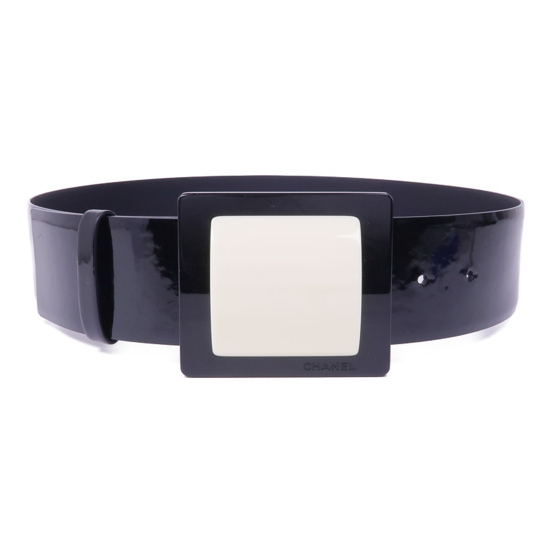 Black Patent Leather Belt with CC Logo by CHANEL Silver Hardware: Black Patent Leather Belt with CC Logo by CHANEL Silver Hardware This women's belt by Chanel features black patent leather and a CC buckle in silver-tone hardware. Made in France, it offers a sleek an