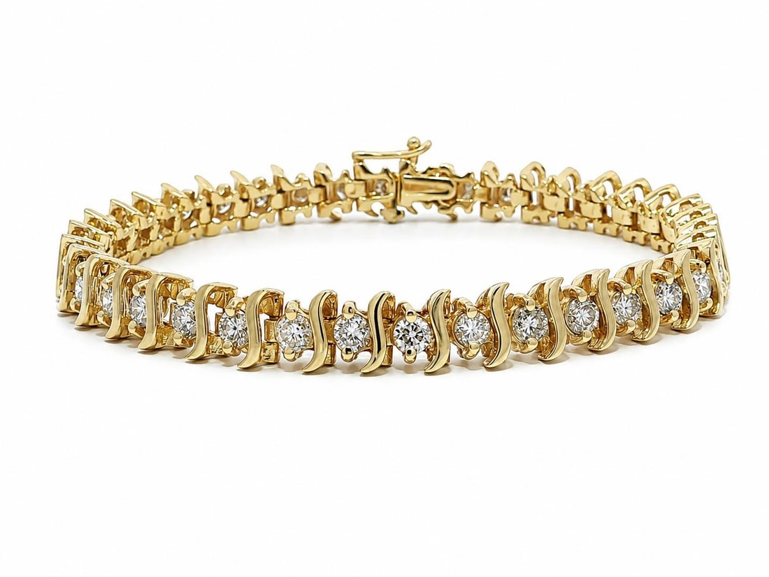 14k Yellow Gold Diamond S Link Tennis Bracelet 3.23ctw 38 Stones: 14k Yellow Gold Diamond S Link Tennis Bracelet 3.23ctw 38 Stones This elegant S link tennis line bracelet features 38 natural round brilliant cut diamonds with a total carat weight of approximately 3.
