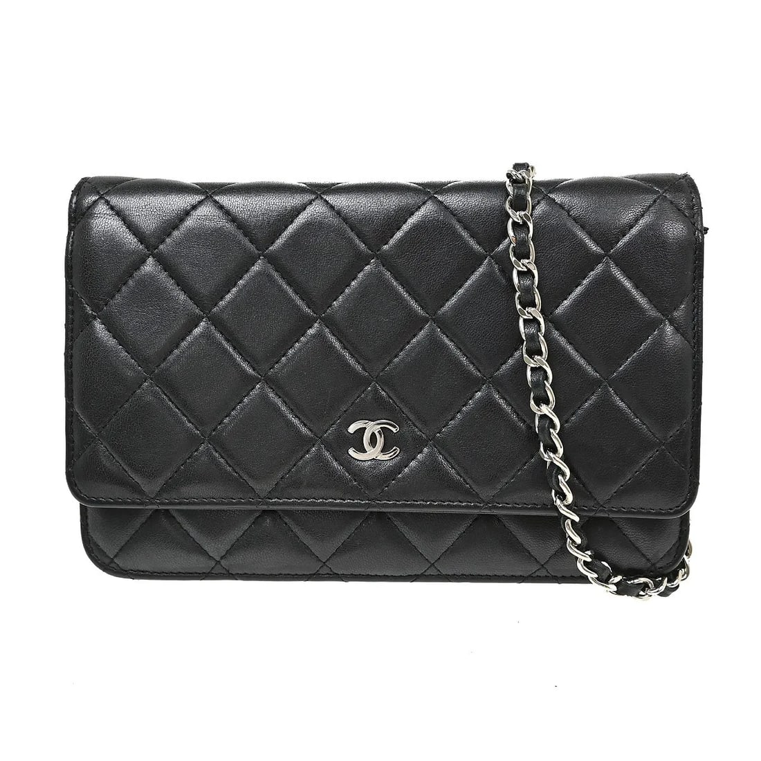 Chanel Wallet on Chain black leather quilted bag: Chanel Wallet on Chain black leather quilted bag Chanel Wallet on Chain in black leather. This women's bag is made in Italy and remains in good condition, with light scratching to the exterior and lig