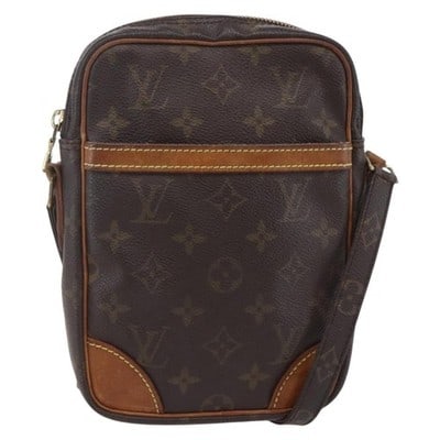 Louis Vuitton M45266 Danube Monogram Canvas Shoulder Bag: Louis Vuitton M45266 Danube Monogram Canvas Shoulder Bag Louis Vuitton Danube shoulder bag in Monogram canvas. This compact shoulder bag was made in France and shows heavy use, including wear to the e