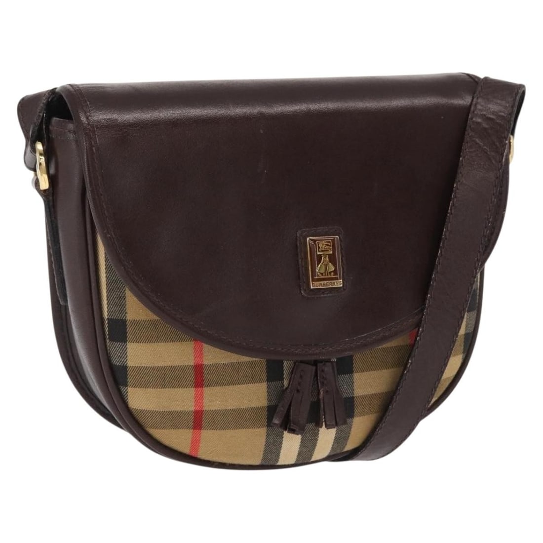Burberrys Beige Canvas Nova Check Shoulder Purse Gold Accents: Burberrys Beige Canvas Nova Check Shoulder Purse Gold Accents This Burberrys Nova Check shoulder bag features a beige and gold canvas exterior with the iconic check pattern. The bag is heavily used, s
