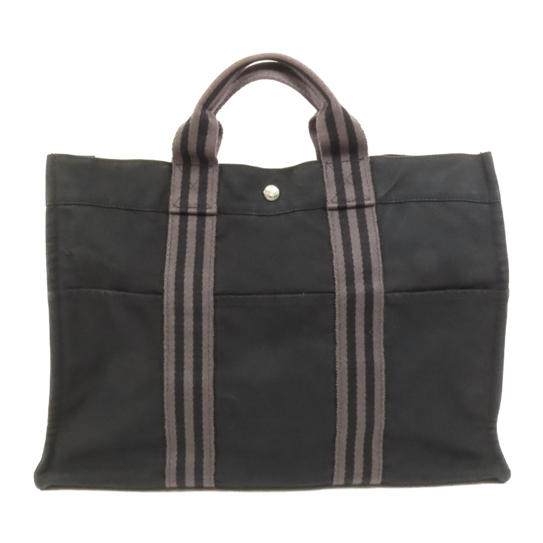 HERMES Fourre Tout PM Tote Bag Black Canvas: HERMES Fourre Tout PM Tote Bag Black Canvas Introducing the HERMES Fourre Tout PM Tote Bag, a versatile and stylish accessory perfect for everyday use. This tote is crafted from durable black canvas, 