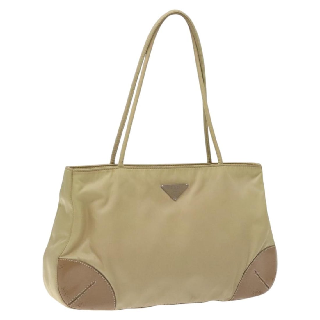 Prada beige silver nylon tote bag Italy 12.6 inch: Prada beige silver nylon tote bag Italy 12.6 inch This PRADA tote bag features a beige and silver nylon exterior with leather accents, offering a classic and versatile design. Made in Italy, the bag i