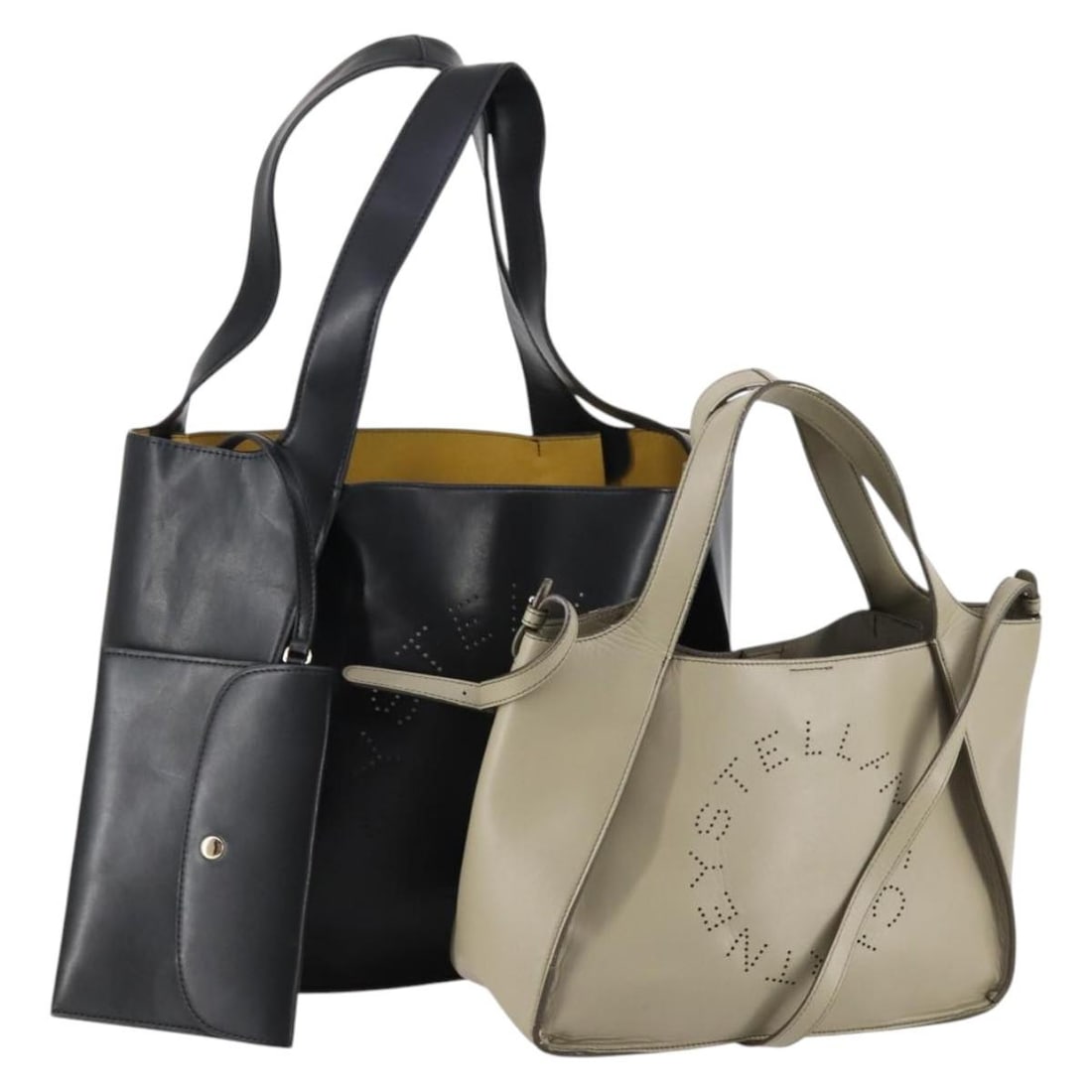 Stella McCartney Leather Tote Bag Set Black Beige Authentic: Stella McCartney Leather Tote Bag Set Black Beige Authentic This Stella MacCartney Tote Bag set features a chic combination of black and beige leather, exuding elegance and style. Designed in Italy, t