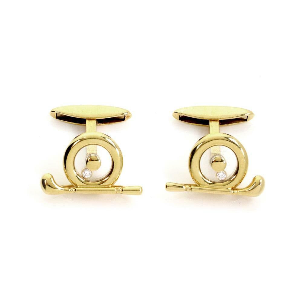 Chopard Happy Diamond 18k Yellow Gold Golf Club Cufflinks with Floating Diamond: Chopard Happy Diamond 18k Yellow Gold Golf Club Cufflinks with Floating Diamond Elevate your accessory collection with this exquisite pair of cufflinks from the renowned Chopard Happy Diamond collecti