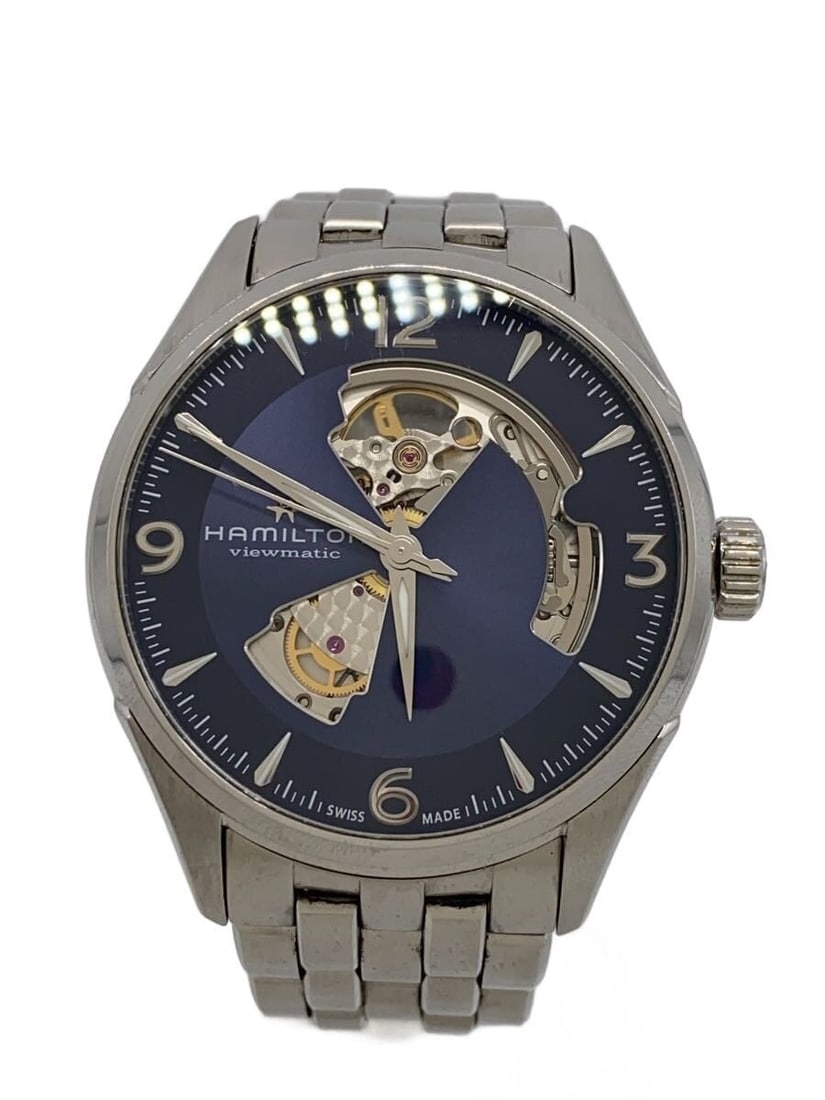 Hamilton Jazzmaster Open Heart navy automatic wristwatch H327050: Hamilton Jazzmaster Open Heart navy automatic wristwatch H327050 This is a pre-owned HAMILTON Jazzmaster Open Heart Automatic wristwatch designed for men. The watch features a navy color scheme and sh