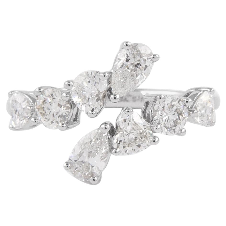 1.52ct Diamond Bypass Ring in 18k White Gold: 1.52ct Diamond Bypass Ring in 18k White Gold This exquisite modern bypass ring features a stunning arrangement of diamonds set in luxurious 18k white gold. Boasting a total diamond weight of 1.52 cara